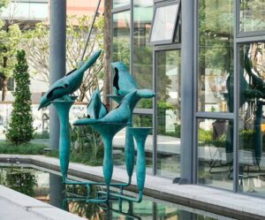 Bronze bird-shaped sculpture water feature