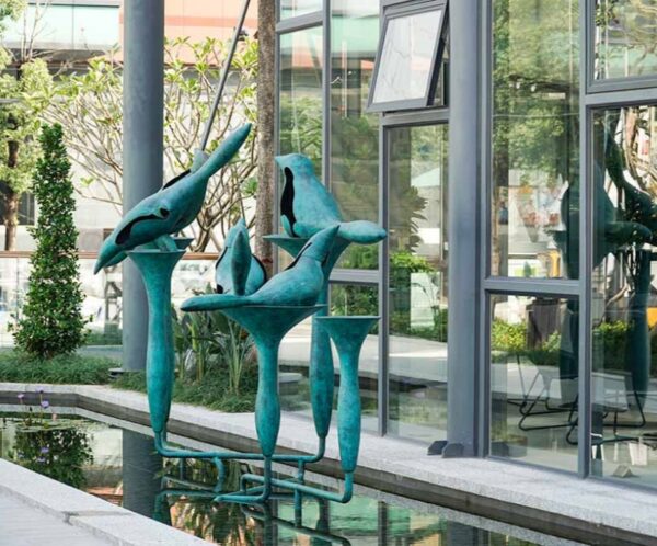 Bronze bird-shaped sculpture water feature